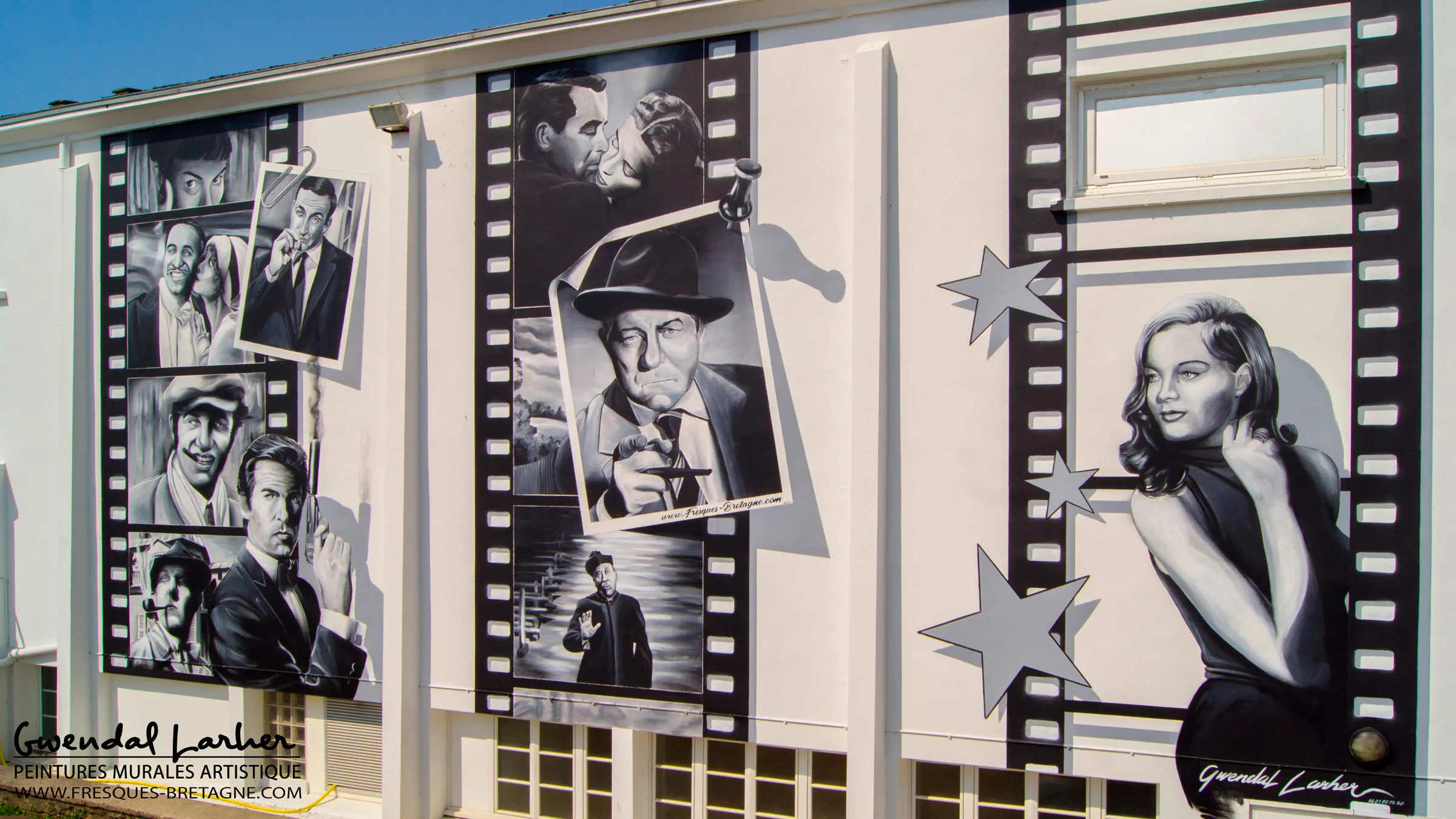 Portrait d' acteurs peints à l'aérosol sur la façade du cinéma Le Dauphin, Plouescat